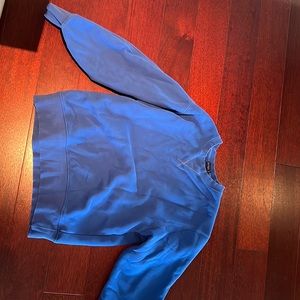 Blue sweatshirt with small cutout design